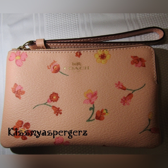 Coach Handbags - Coach pink floral wristlet NWOT!